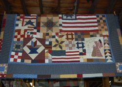 Quilt with American Fags and Geometric Shapes | Arts & Crafts Exhibits