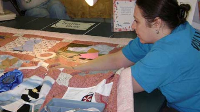Woman Hand Sewing a Quilt | Quilting - Daily Entertainment